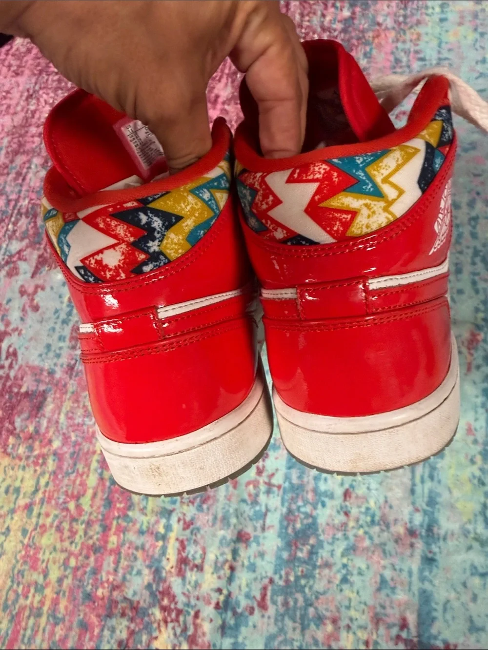 Jordan men’s High Top Sneakers in Red and White with Multicolor Collar